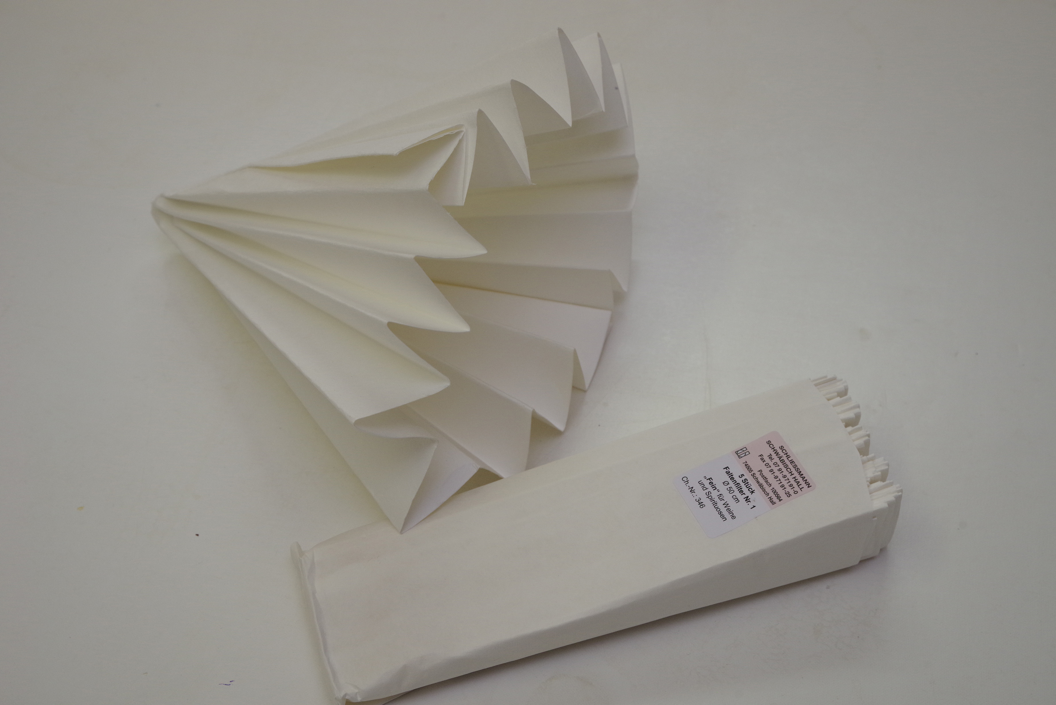 Pre-Folded Paper Filters